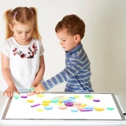 TickiT Junior Rainbow Pebbles Clear -kinderspellen Winkel 550x497 4